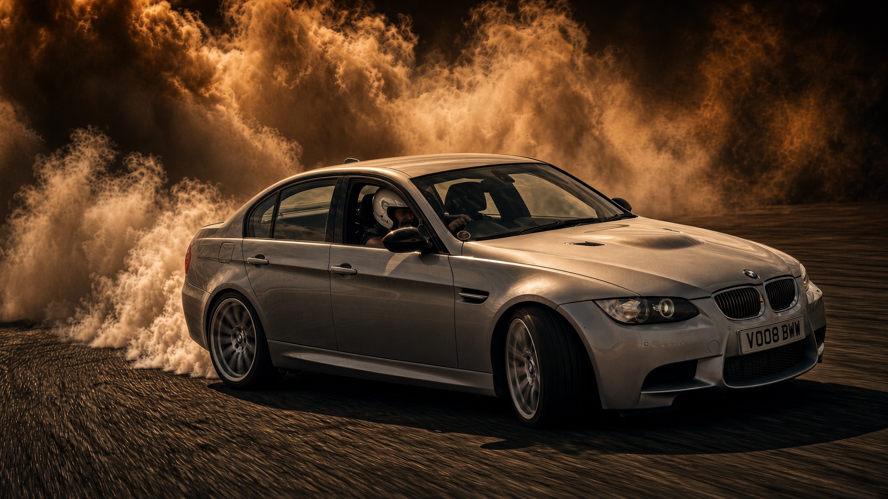 BMW E90 M3 mid power-slide on a film set with sparks and tyre smoke